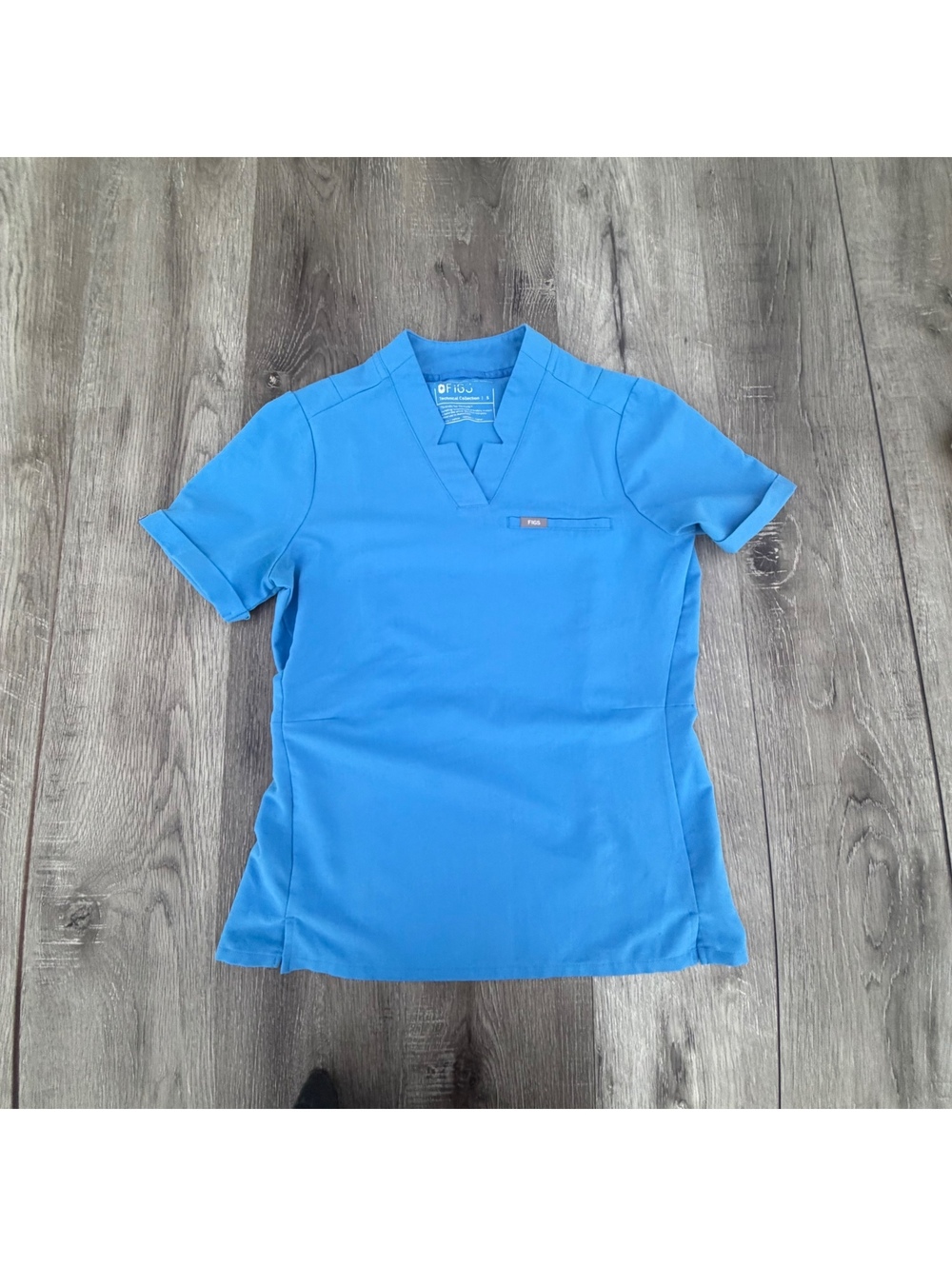 Women’s blue figs scrub top size S